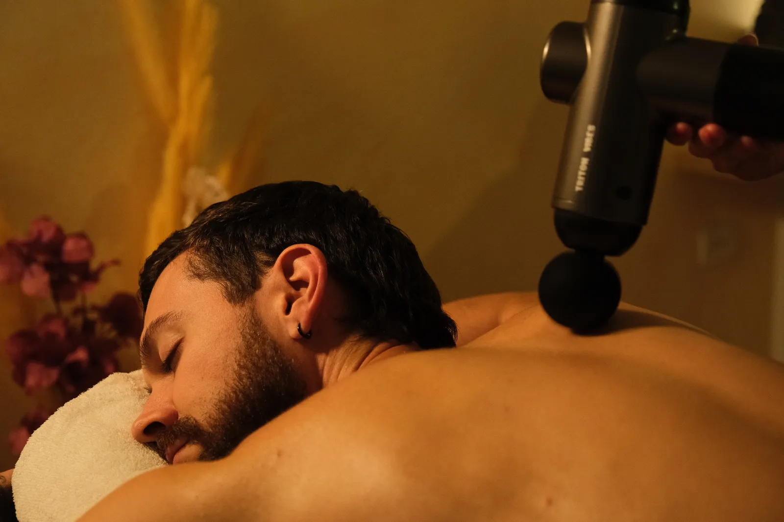 Man receiving a percussion massage